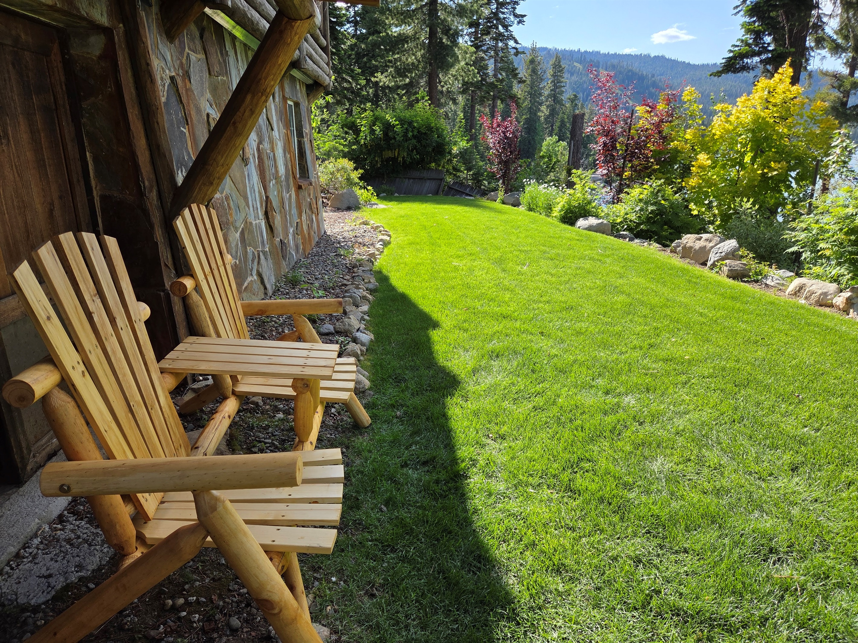 Relax and watch the lake, the wind blow in the trees while the kids or dogs play on the grass!