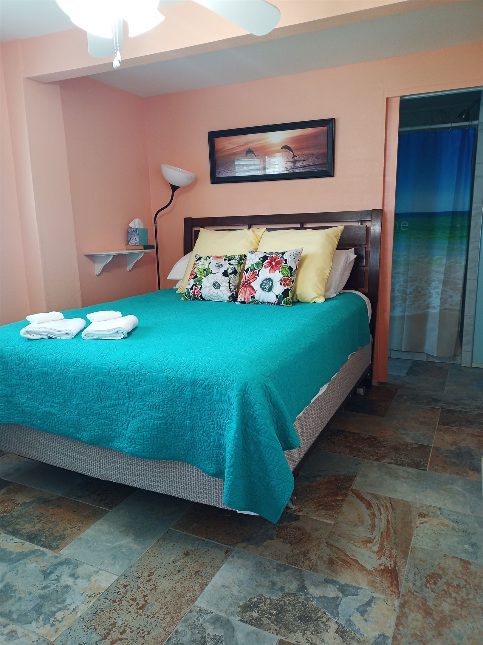 Downstairs bedroom with queen