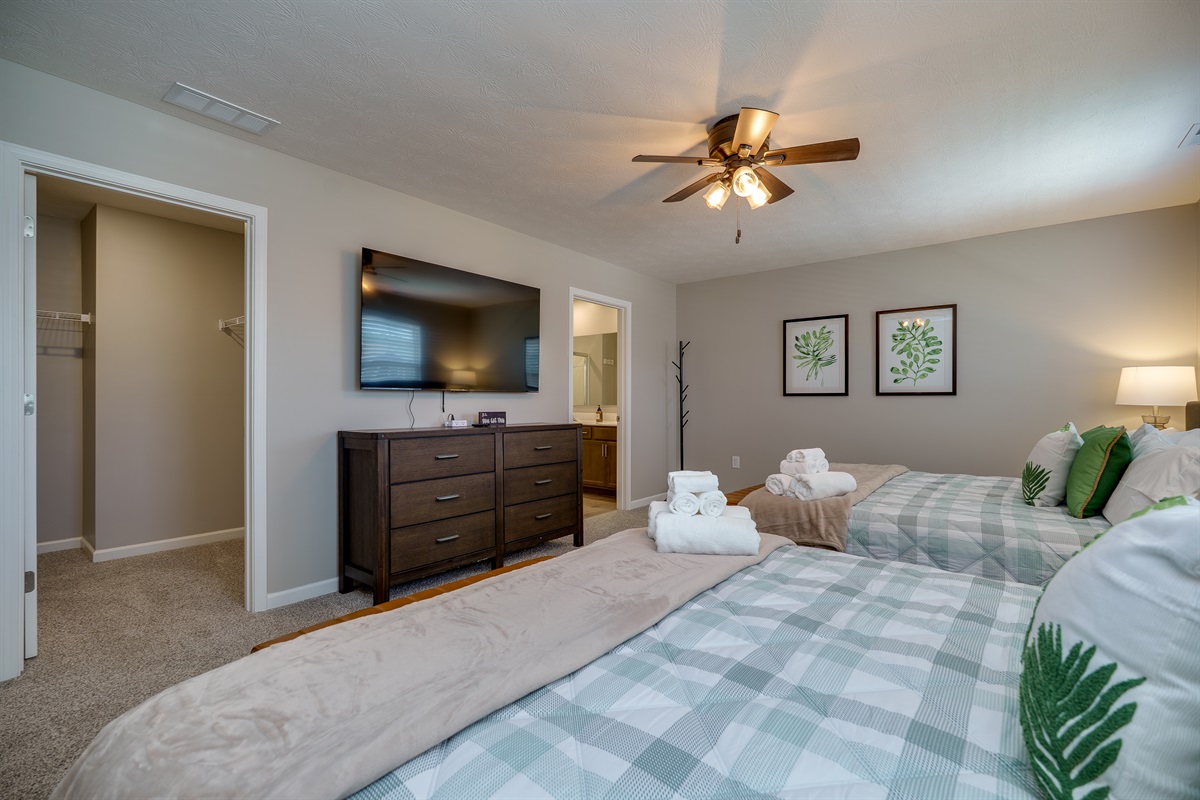 Relax in This Spacious Bedroom with TV