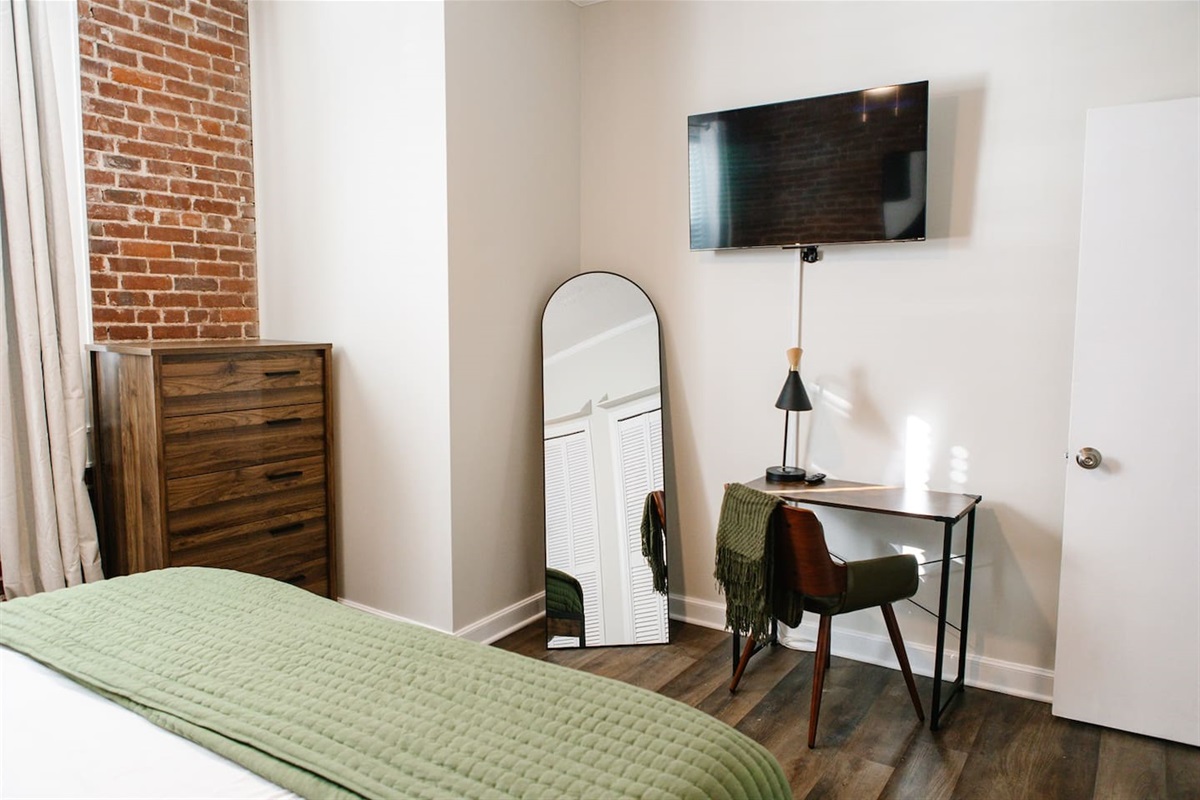 Workspace and TV in Master Bedroom