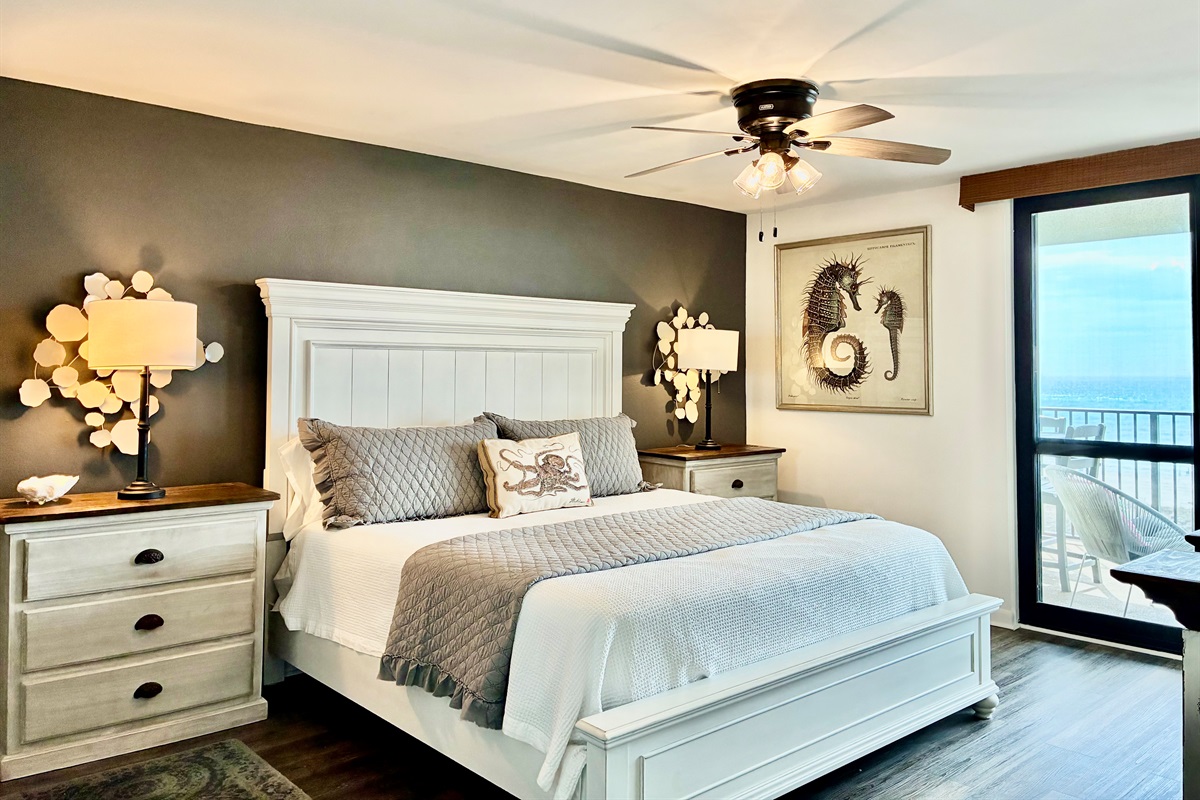 Here's the gorgeous master bedroom with a King bed.