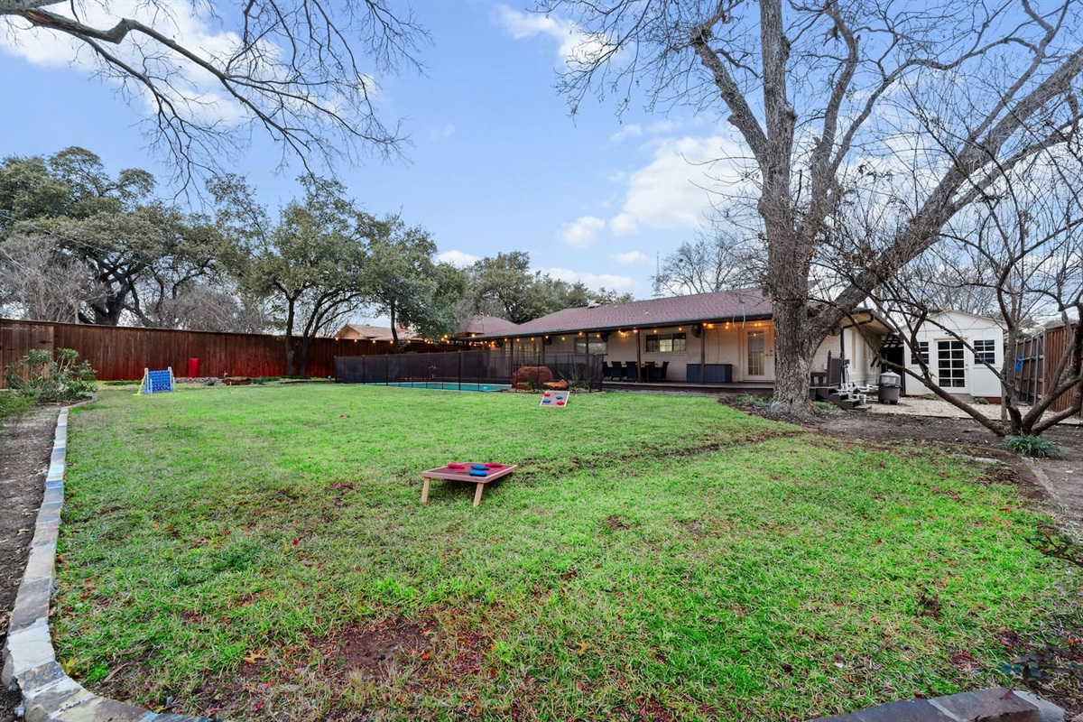 Massive backyard with fun yard games and space for the whole crew to spread out.
