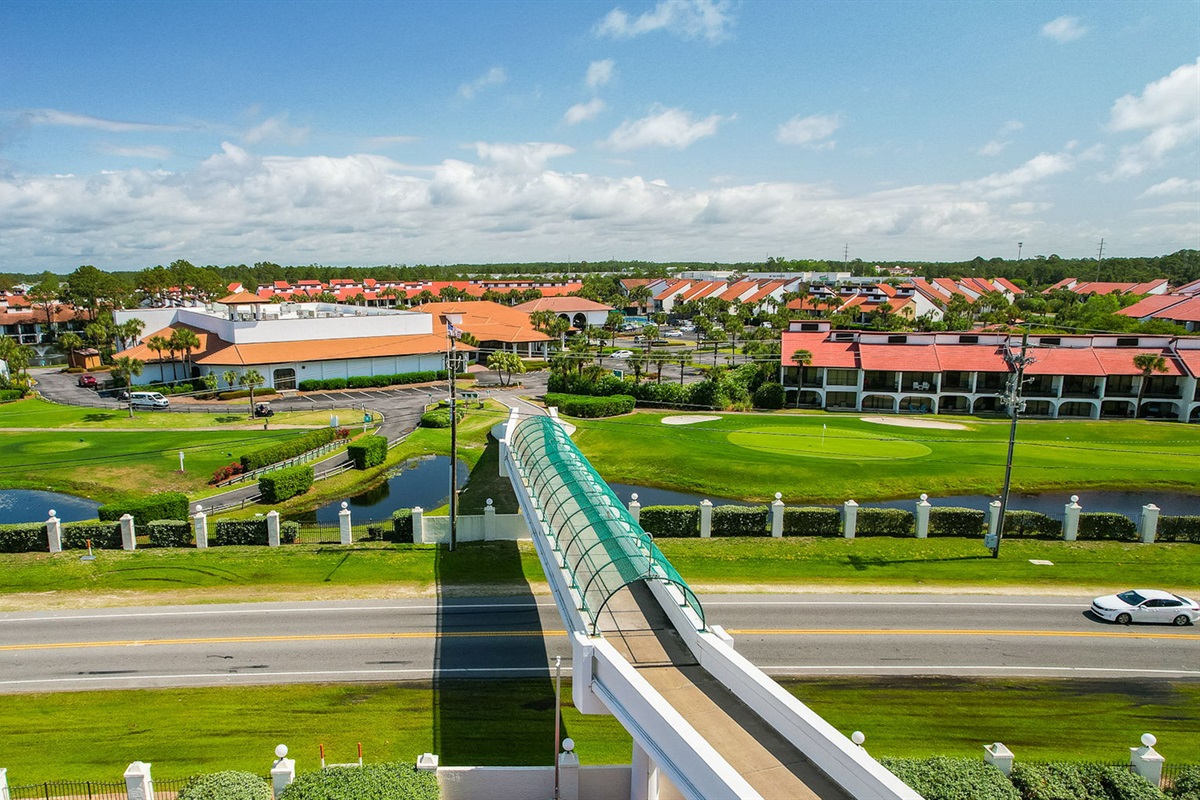 Pedestrian walkover bridge connecting the golf villas to Edgewater's beachfront amenities