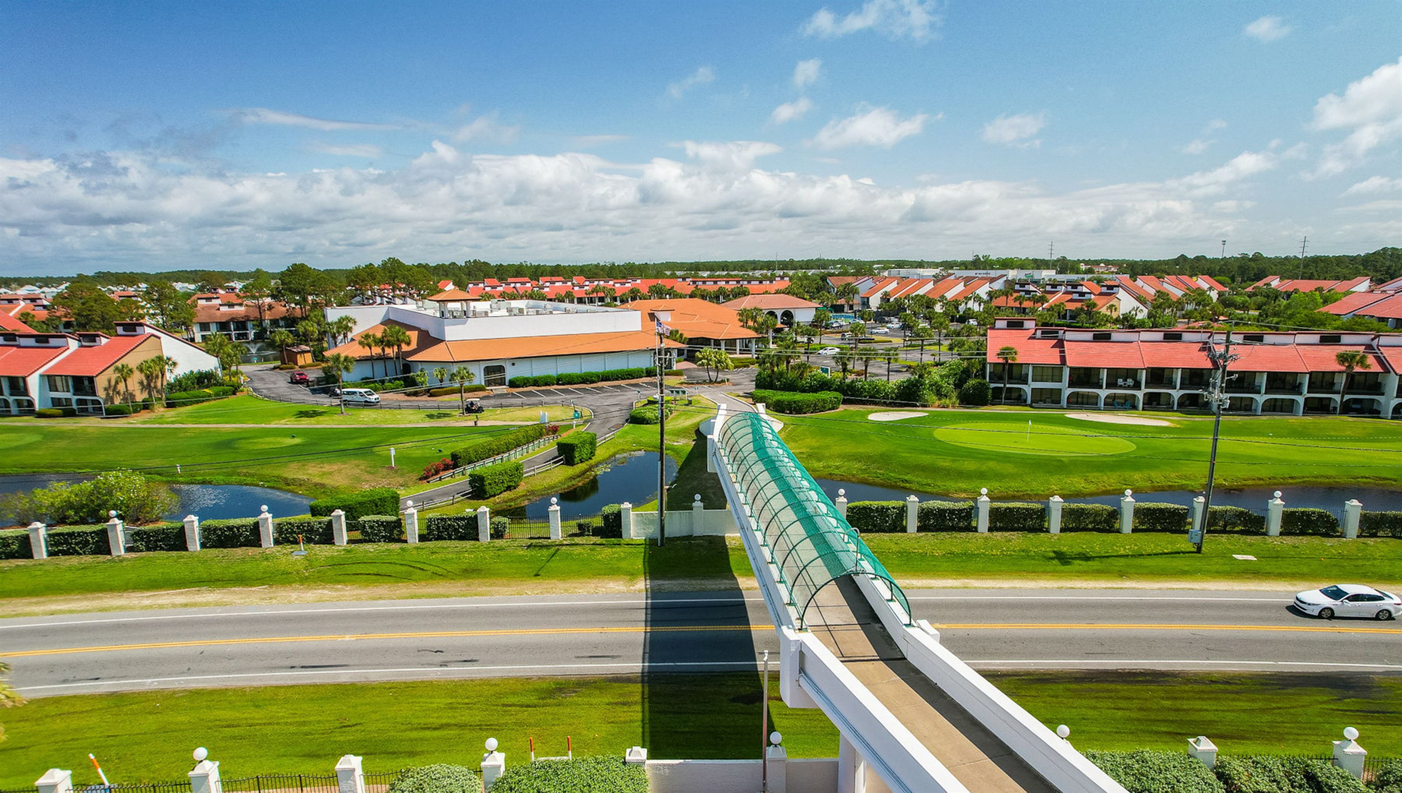 Pedestrian walkover bridge connecting the golf villas to Edgewater's beachfront amenities