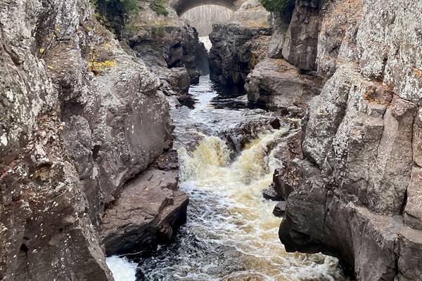 Stunning gorge at Temperance River State Park, featuring rushing waters and a bridge spanning the canyon. Just 5.6 miles from our cabin, it’s the perfect spot for a quick hike. 