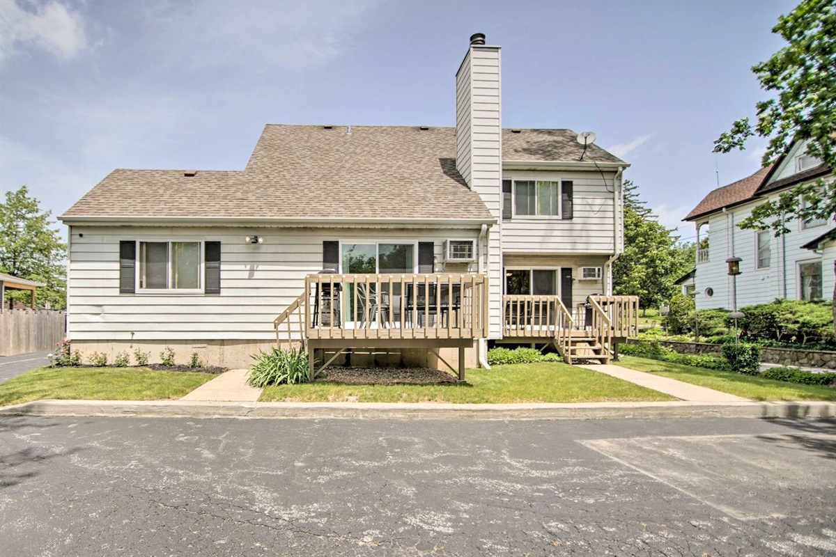 3Bd & 2Bd Units:  The back of the house, showing both vacation rental units with private decks. The 3Bd Unit deck is on the left. The recessed for privacy 2Bd unit deck is on the right. Ample free parking is available for two cars per unit.