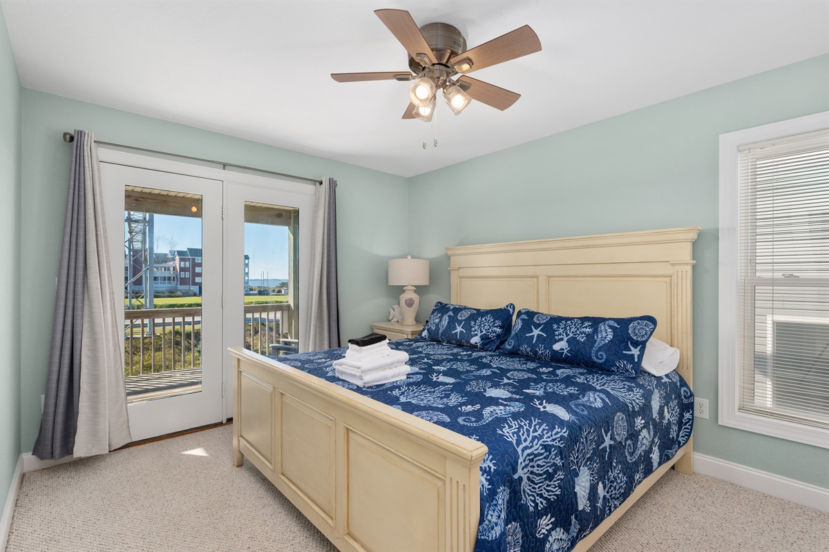 Inviting King bedroom located on the 2nd floor with serene beach-inspired colors.
