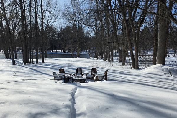 Snow-covered private waterfront, peaceful views and a cozy fire pit area. The perfect setting to slow down and enjoy a true Ontario winter getaway.