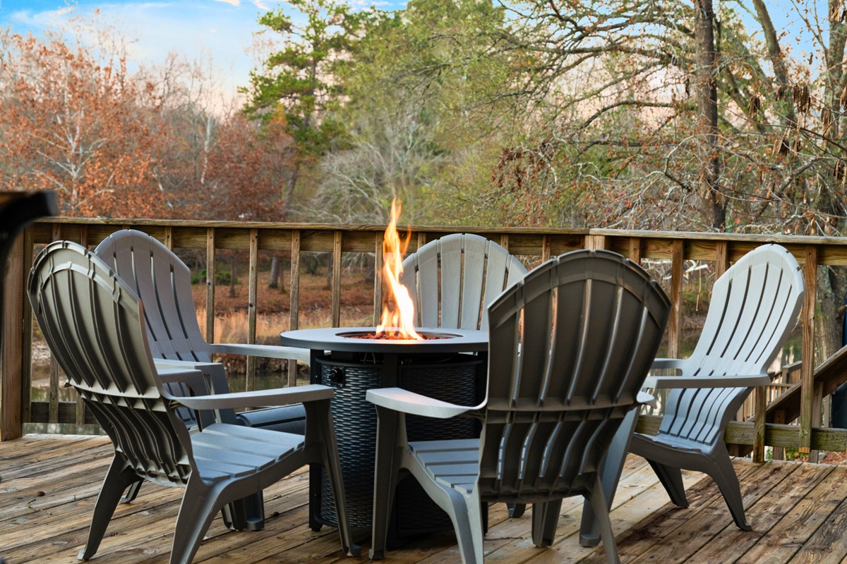 The firepit creates a naturally inviting gathering place where stories, laughter, and quiet moments can be shared under the sky.