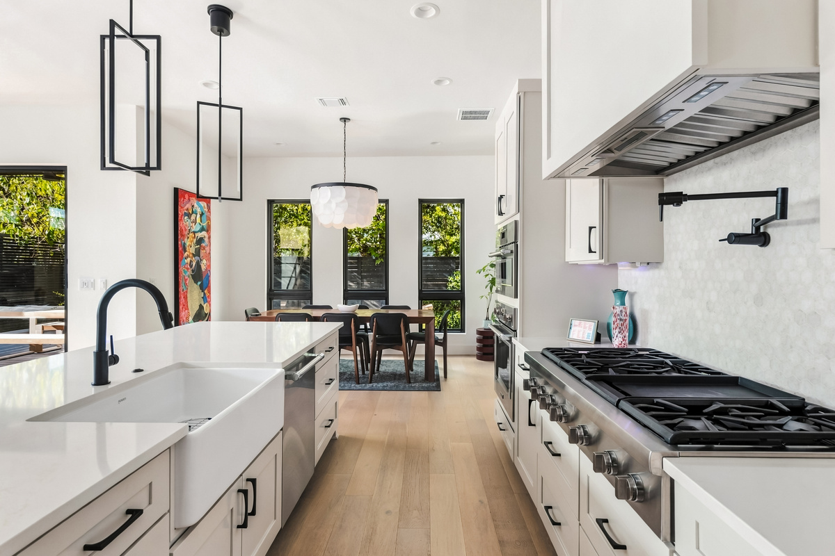 Gas range and hood set the stage for home-cooked group dinners