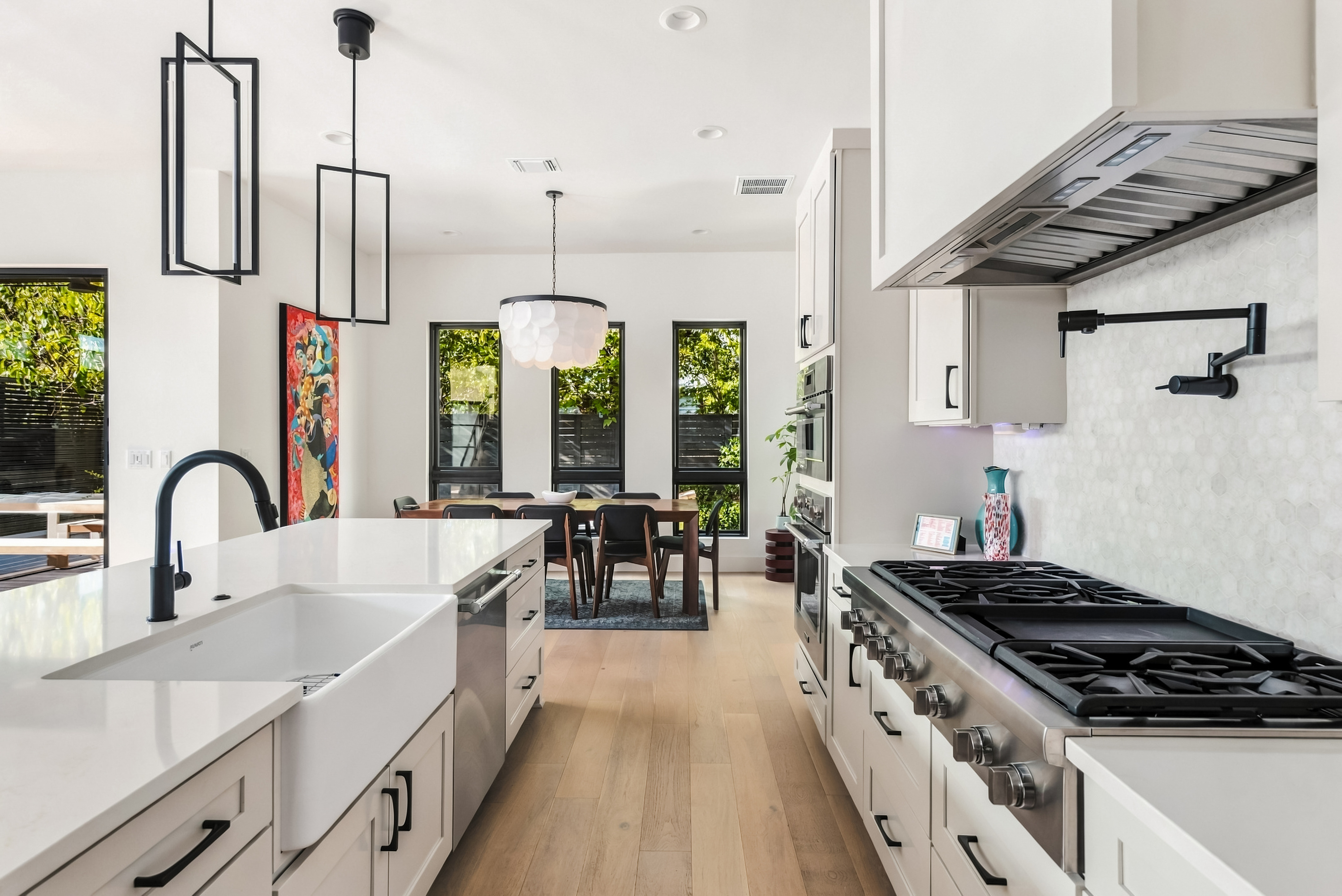 Gas range and hood set the stage for home-cooked group dinners
