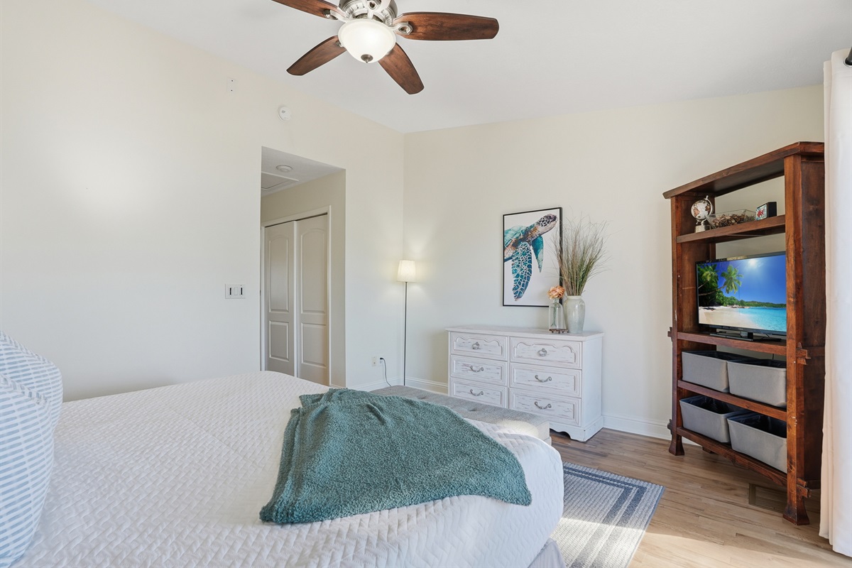 Bedroom #1 with King Bed and Balcony Access Overlooking the Back Yard