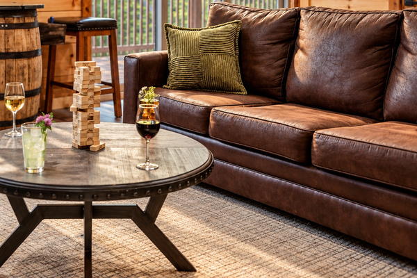 Stack Jenga blocks with friends as afternoon sun spills through the slider.