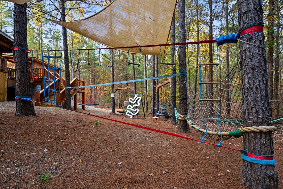 Tucked right into the forest, this ropes-and-swings playground gives kids plenty to climb on while you relax nearby.