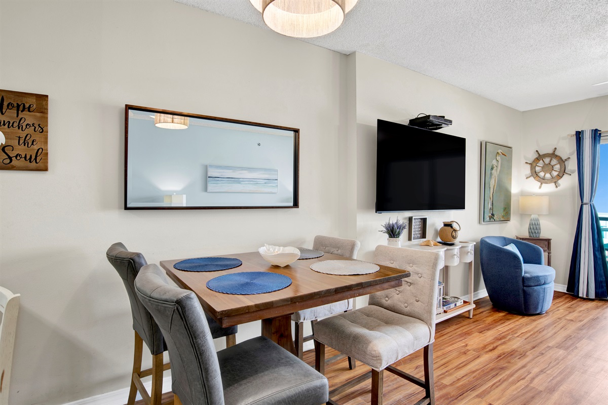 Dining area with table and chairs for 4 