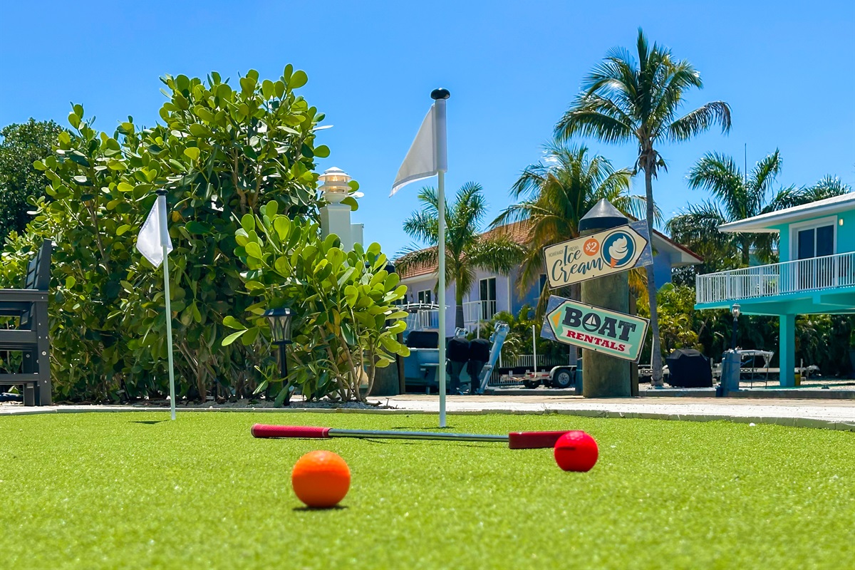 Entertainment inside and outside, like a putting green by the water.