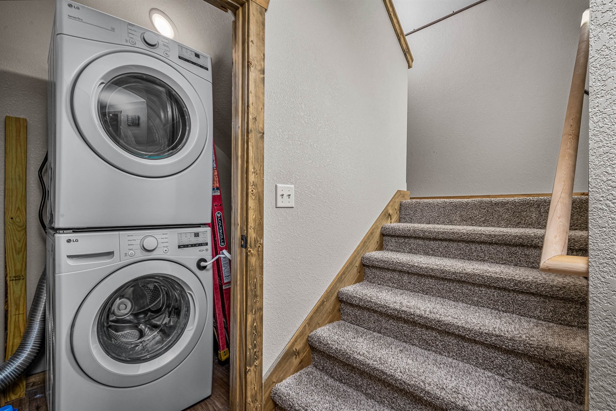 Stackable washer and dryer on the lower level