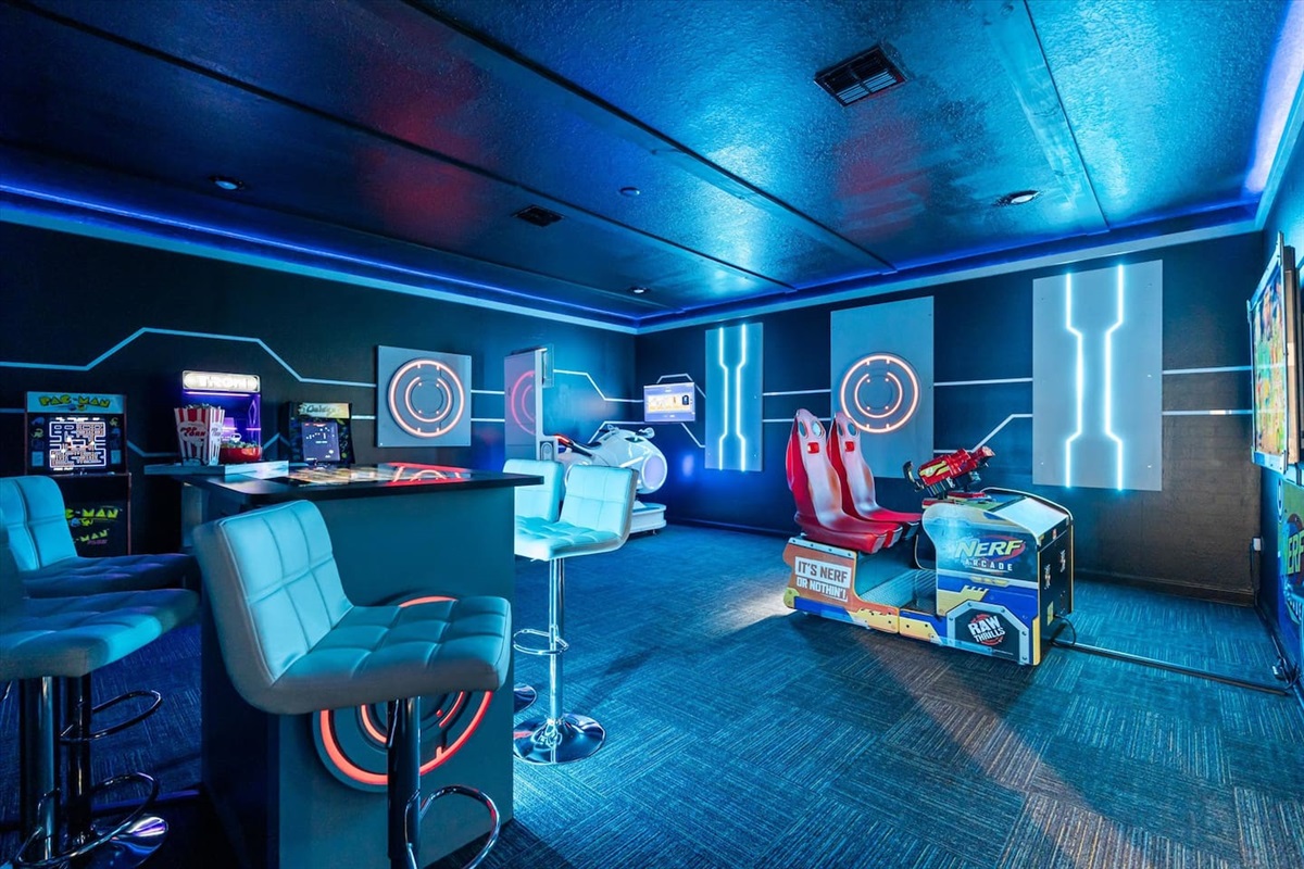 Game time! Keep the family entertained with our Nerf Blasters arcade, fully articulating Tron Cycle, Infinity digital board game table and 3 mini stand up cabinets: Tron, Pacman, Galaga.