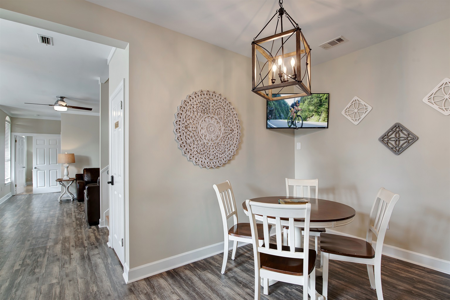 Cozy breakfast nook with wall décor and natural light