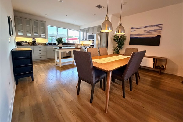 Main living space looking toward the dining room and kitchen.