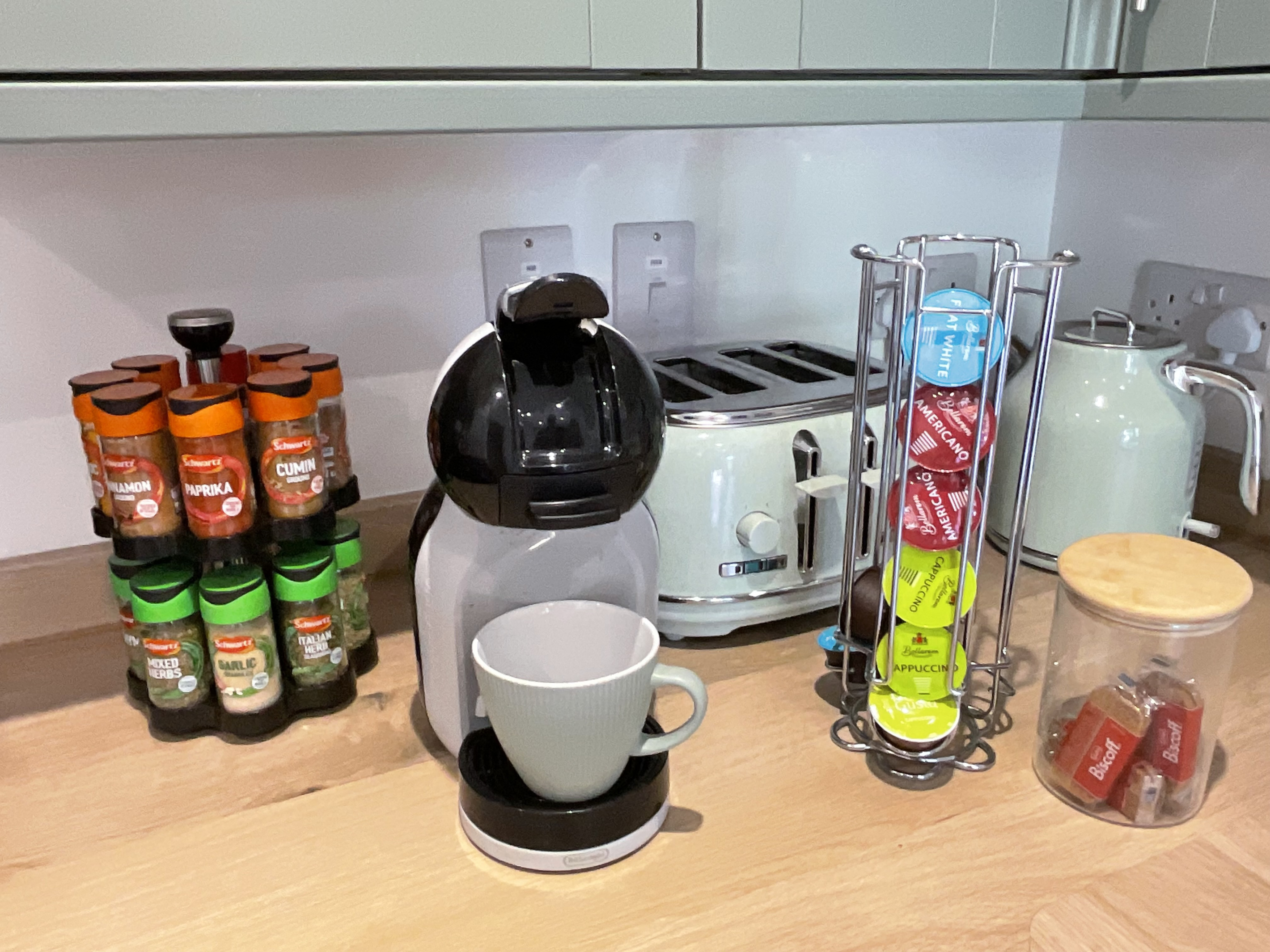 Complementary coffee, biscuits, spice rack.