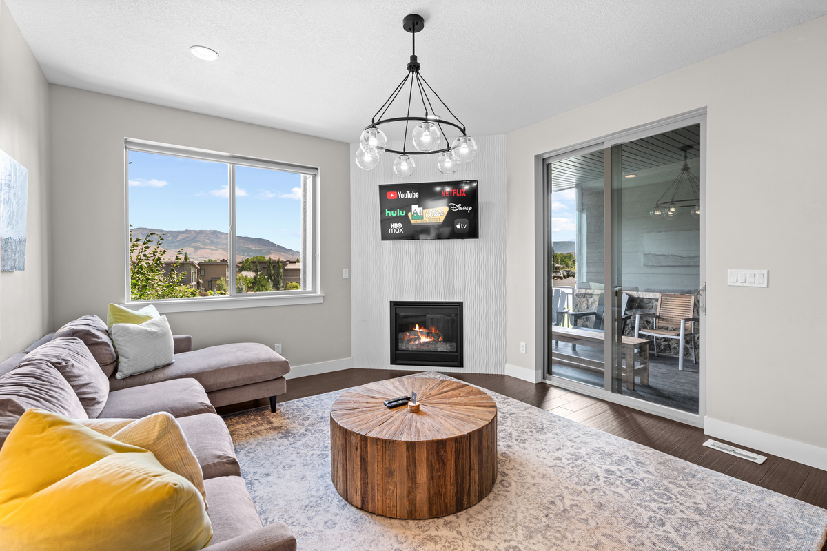 Inviting living room with comfortable seating and warm natural light.