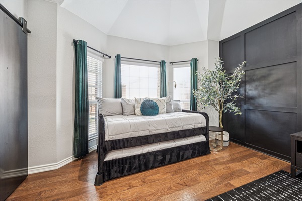 Cozy corner for reading, relaxing, or accommodating additional guests.