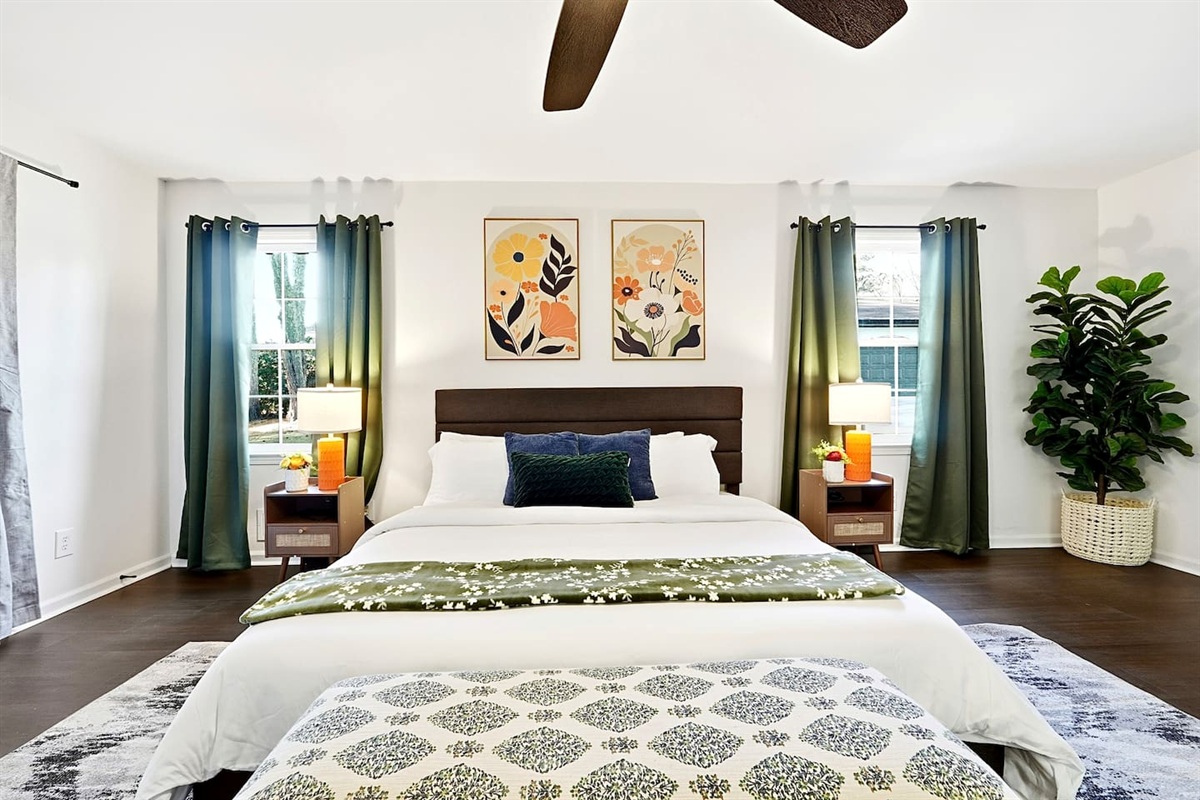 Spacious first-floor master bedroom located to the far right as you enter through the front door. This earthy, calming retreat features a king bed and smart TV. This room includes 2 full-body towels, 2 washcloths, and 2 hand towels for your stay.