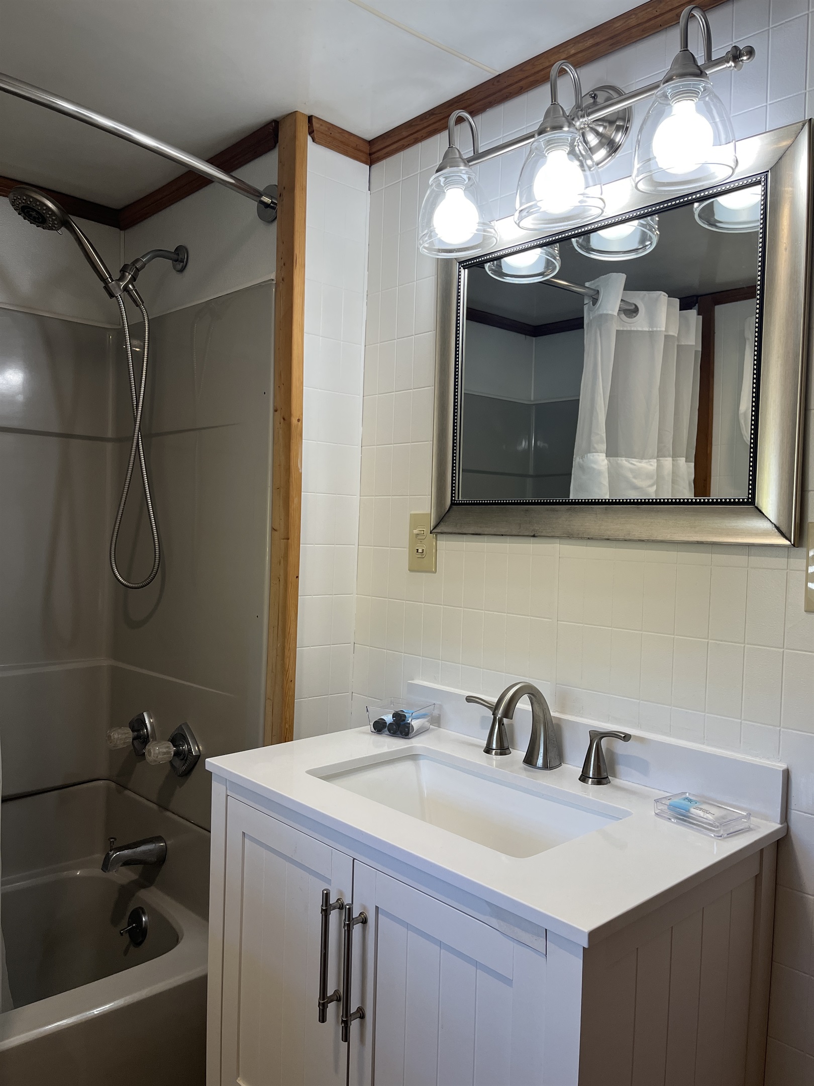 Roundtripper 1st floor bath with tub/shower located next to the kitchen.