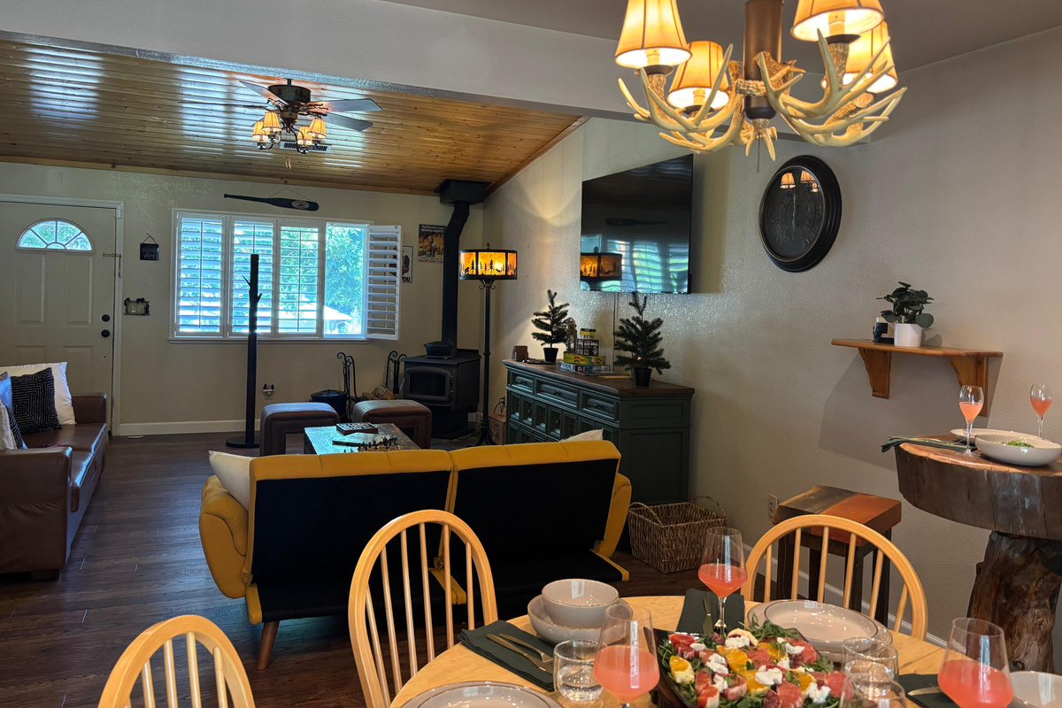 The expansive living room flows seamlessly into the dining area, creating a space perfect for cherished moments!