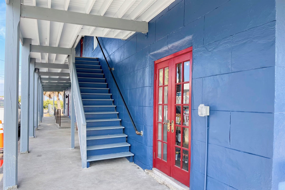 Side stairs of building leading up to apartments