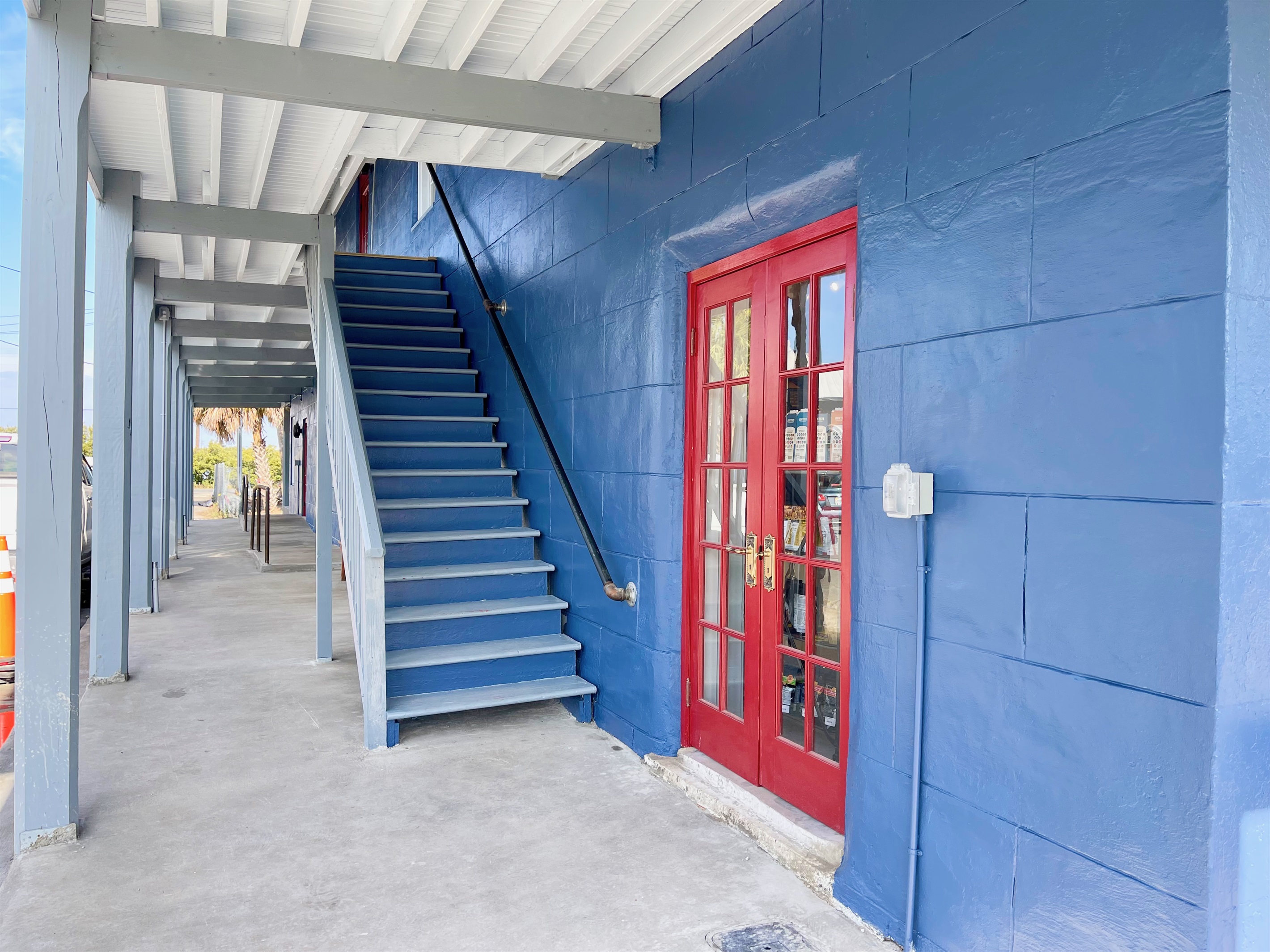 Side stairs of building leading up to apartments