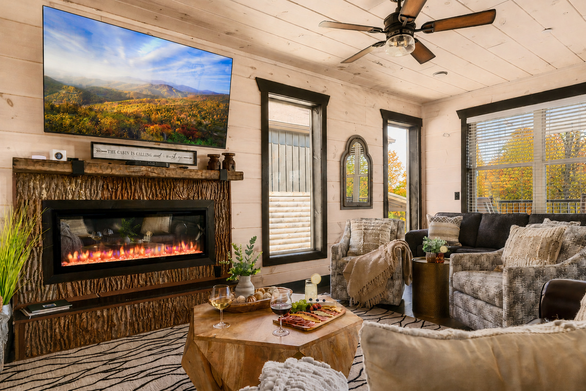 Our designer living area features 2 sofas (one a queen sleeper) and 2 swivel chairs.  Come stream your favorite shows in front of our custom fireplace.