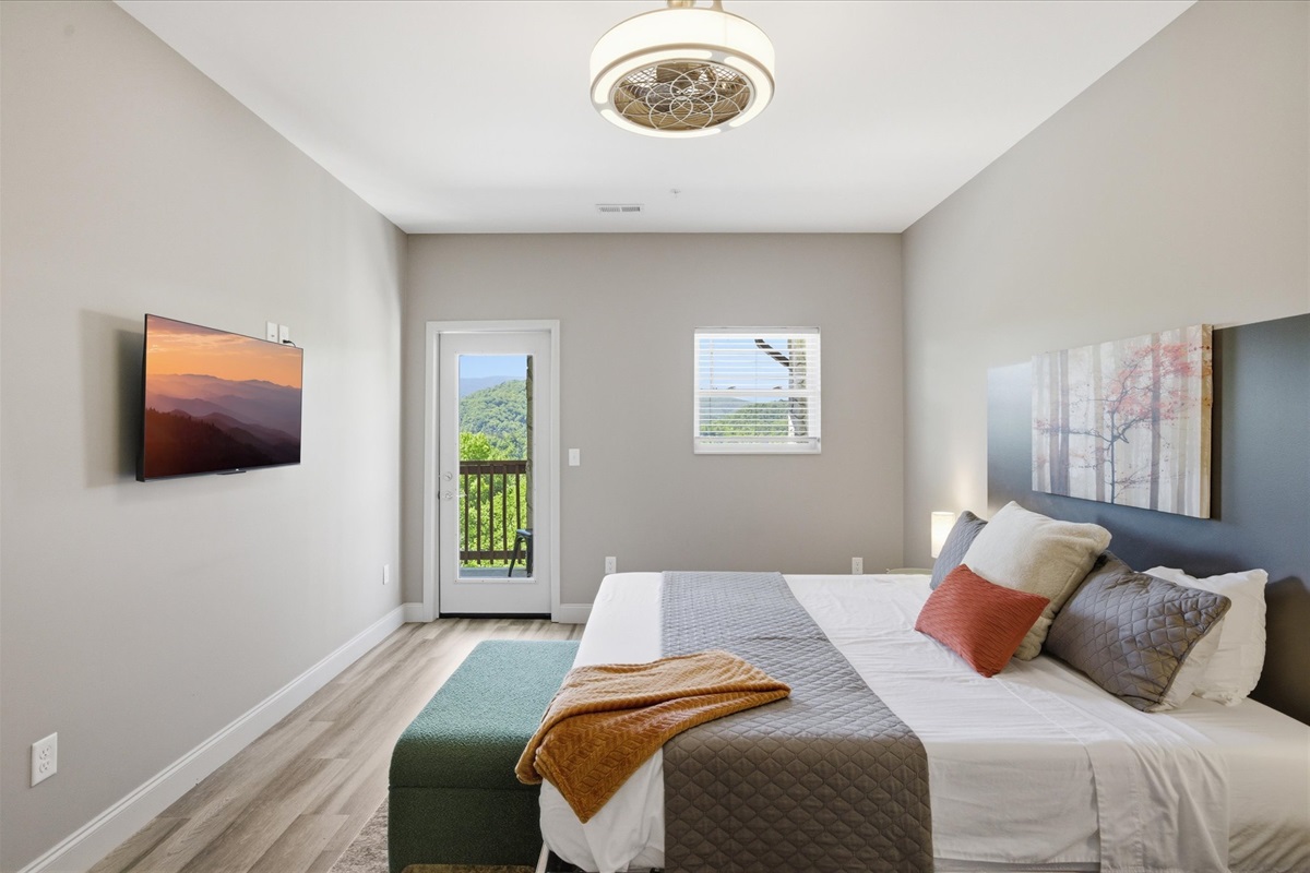 Everything feels easy here—soft bedding, a calm layout, and a TV that lets you slow things down without leaving the room.