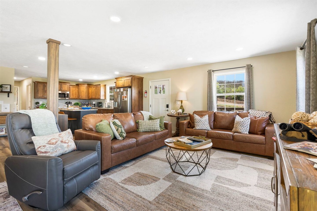 Bright and comfy living space with open layout and lake views (main level)