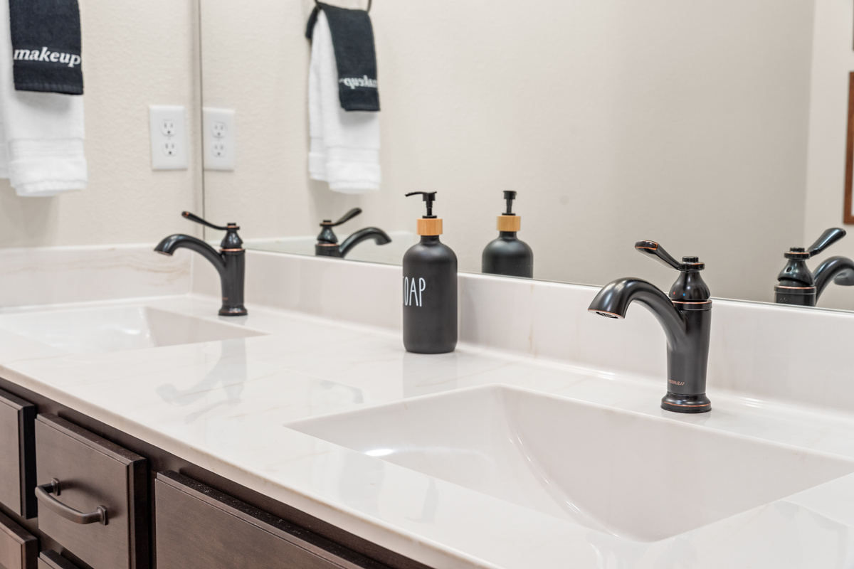 Two sinks and stone counters mean no waiting your turn in the morning.