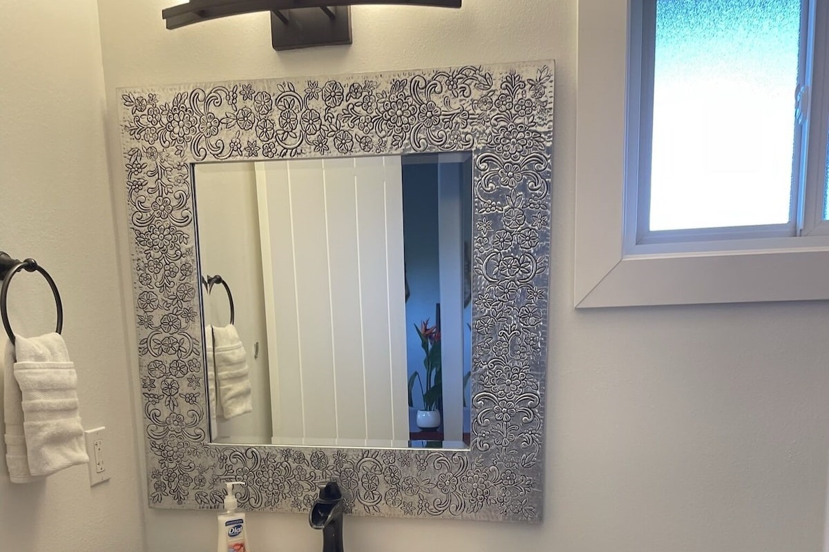 Downstairs full bathroom with custom walk in shower.