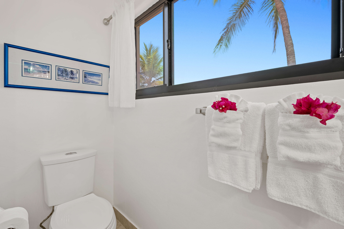 Thoughtfully designed primary bath with modern comforts for your stay.