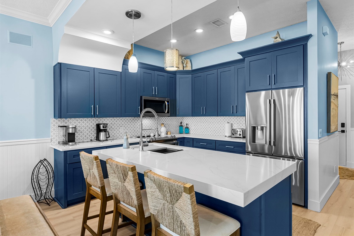Fully equipped kitchen: granite counters, stainless appliances, plus a wine cooler/ice-maker & kitchenette. Dining room and breakfast bar seat 10 comfortably