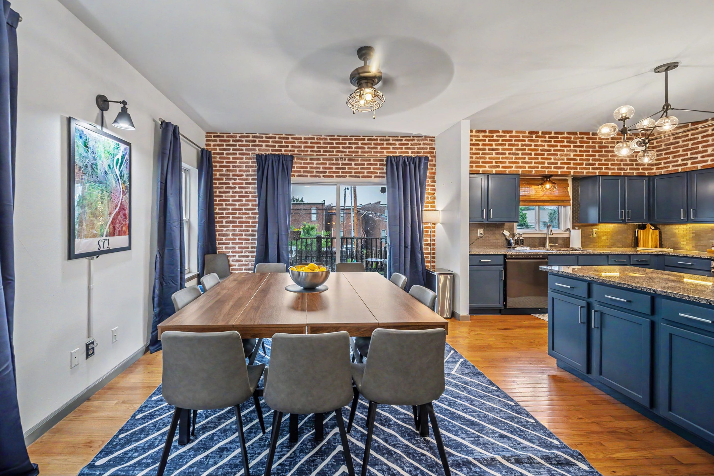 Open-concept kitchen and dining space with seating for up to 14 guests.