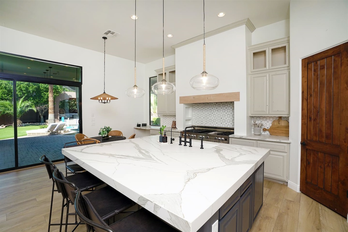 Gourmet kitchen with gas appliances and nearly-infinite island space.