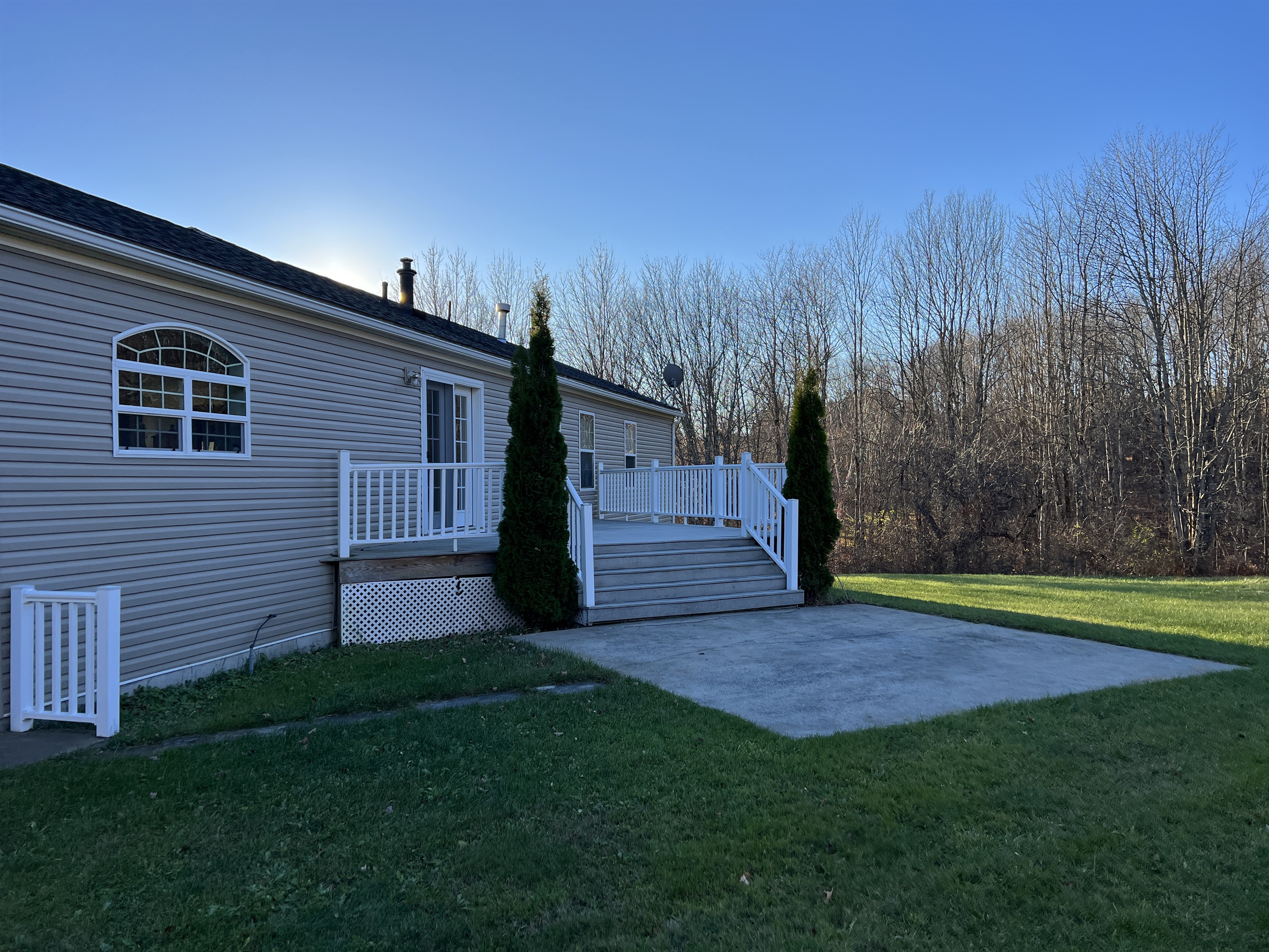Rear patio and rear deck off dining area