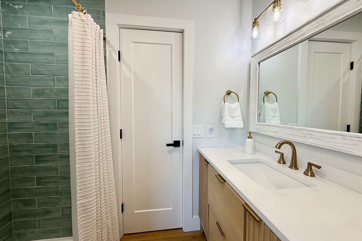 Tile stand up shower.