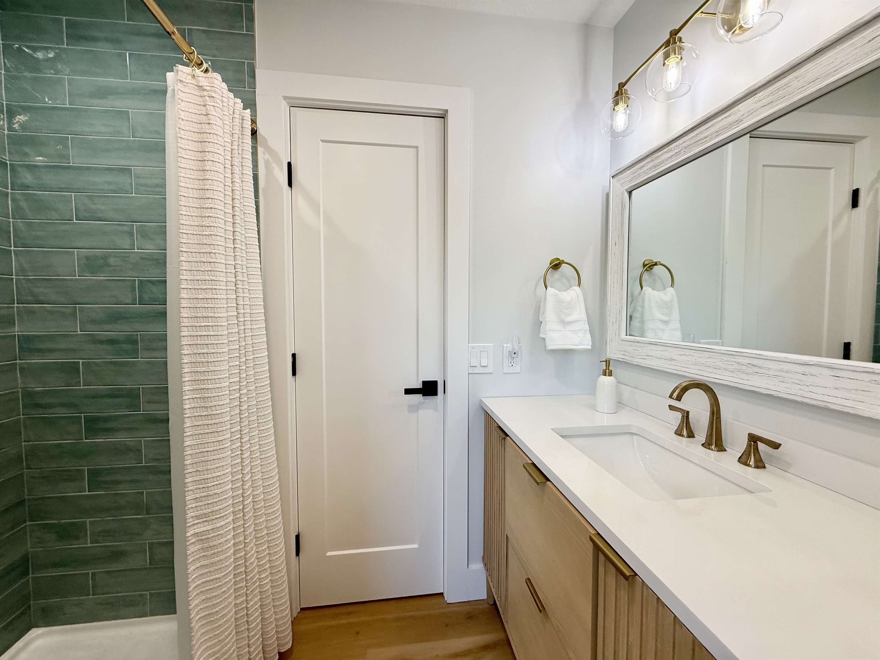 Tile stand up shower.