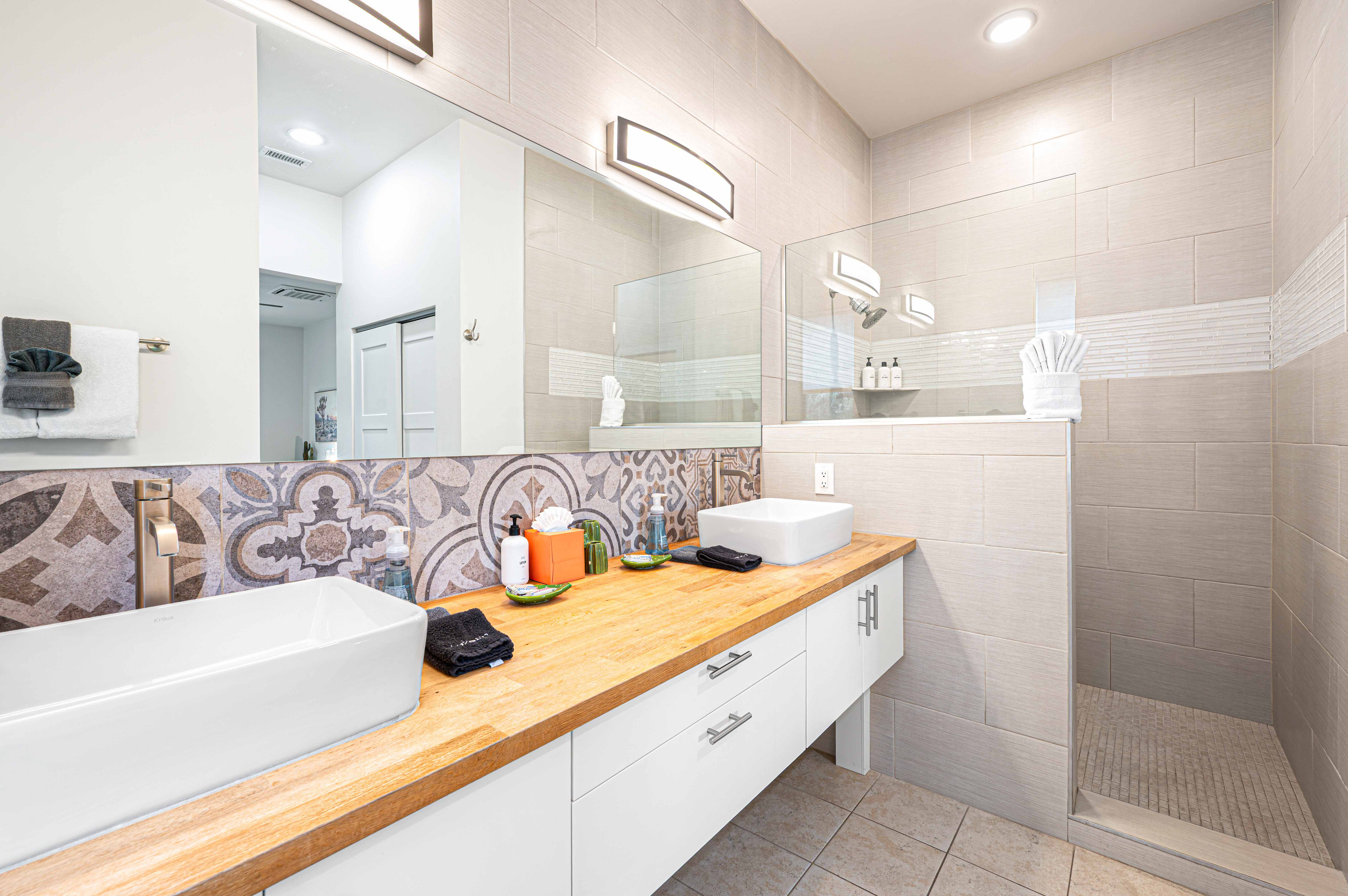 {Bedroom 2 Spa Bath} Enjoy your own private ensuite bathroom with a spacious vanity and walk-in shower.