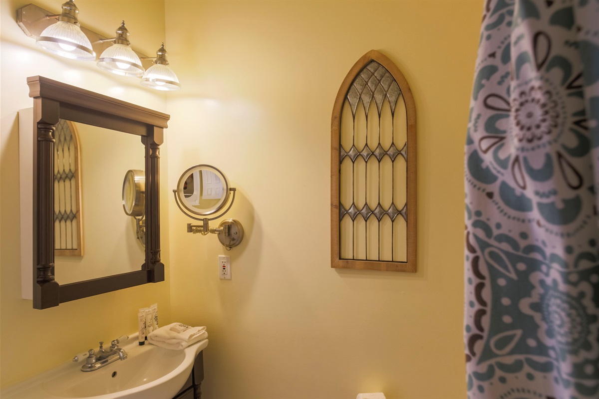 Clean and functional, the ensuite bath offers modern comfort just steps from the queen bedroom.