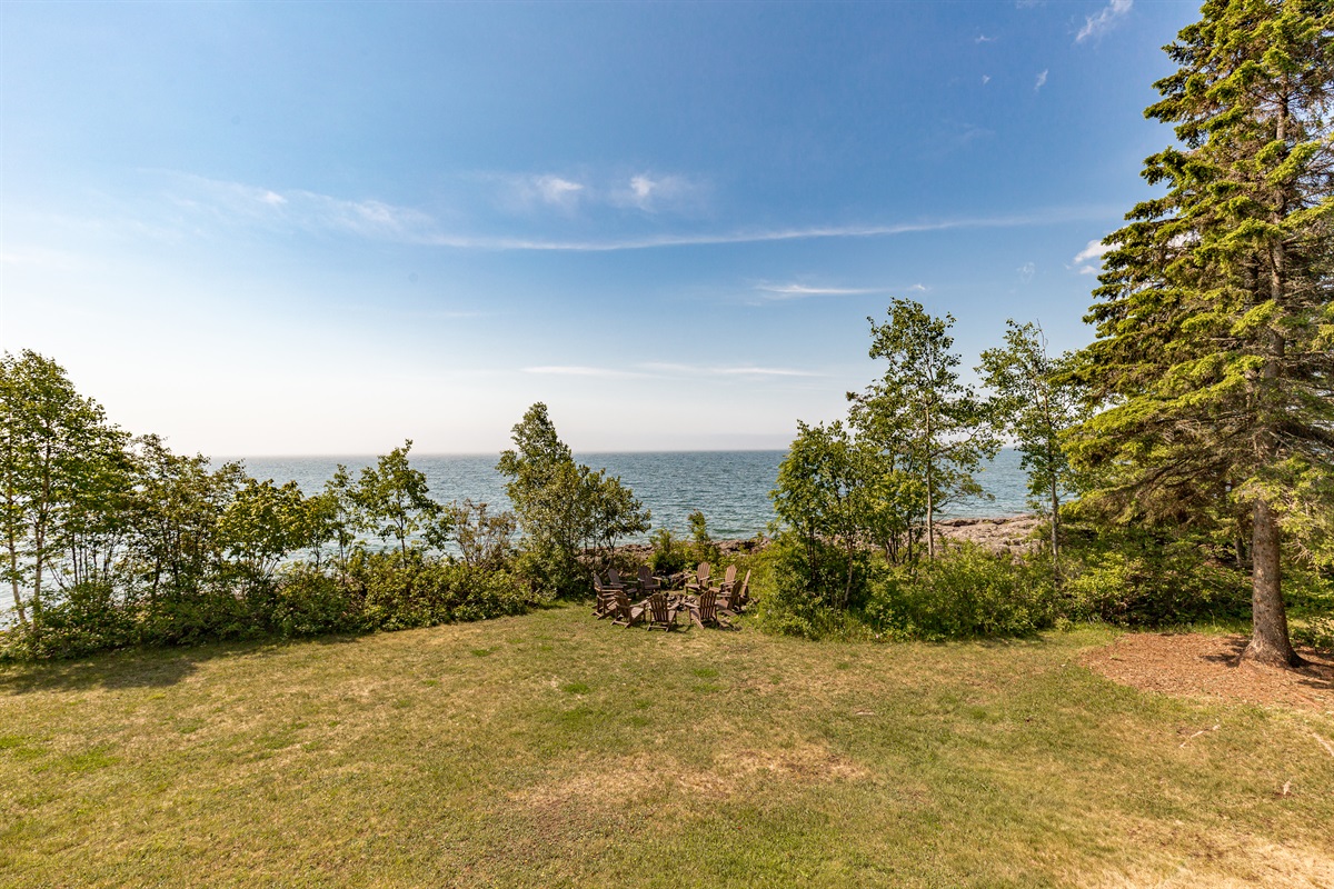 Enjoy the large yard with small slope to the lake.