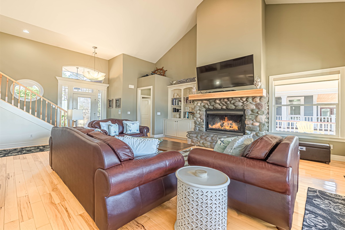 Enjoy a cozy fire in the wood burning river rock fireplace!