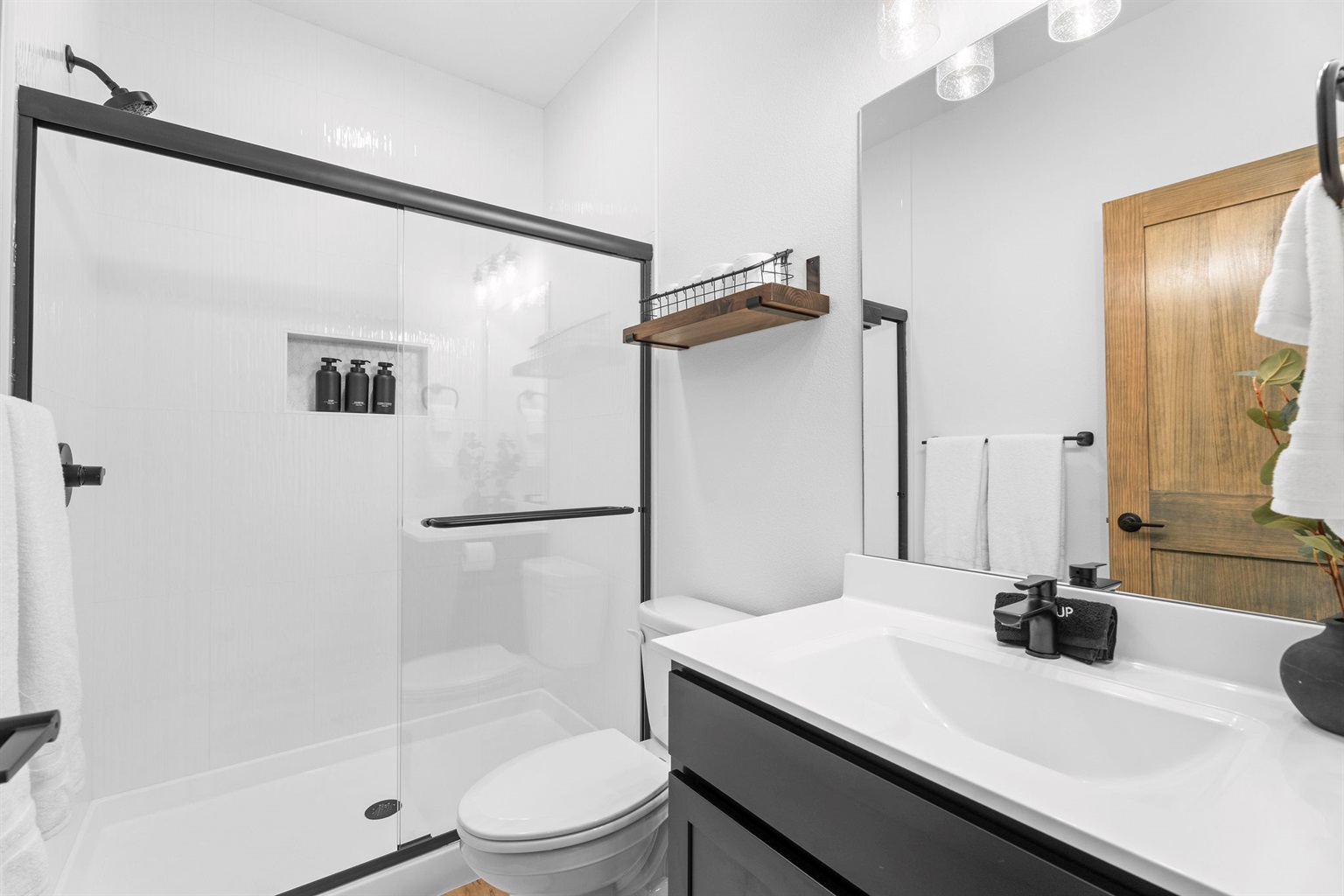 Clean, modern bathroom with a spacious walk-in shower.