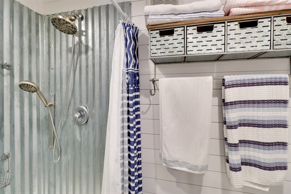 Bathroom in Container #1 features full size shower.